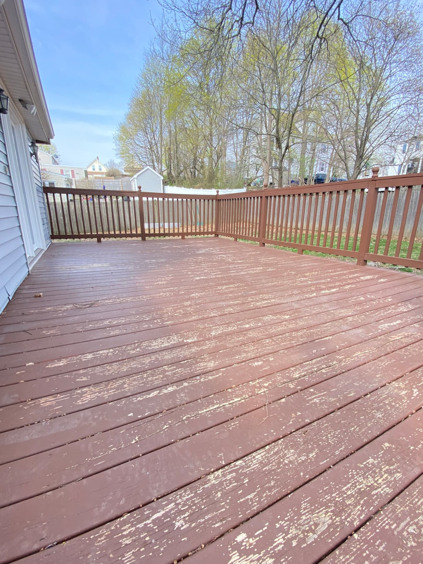 Before: weathered, greyed wood deck in Braintree, MA